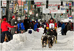 Day-4-Wendy-Zens-Iditarider-Mitch-Seavey-2016-Iditarod-Ceremonial-Start-Photo-c-Laurent-Dick-Wild-Alaska-Travel